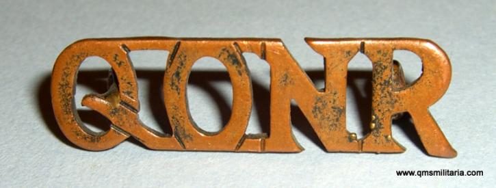 QONR  - Queen 's Own Nigeria Regiment Blackened Brass Shoulder Title, 1956 - 1960