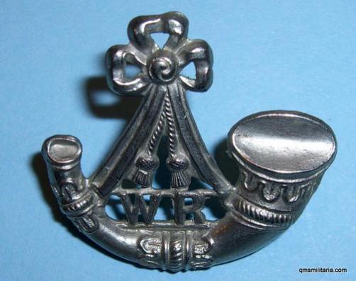 South African Witwatersrand Rifles single white metal collar badge