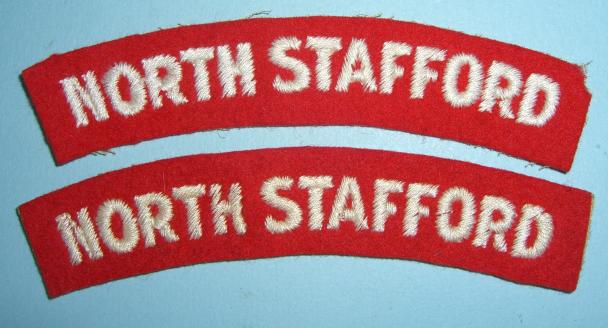 North Staffordshire Regiment White on Red Embroidered Cloth Matched Pair of Shoulder Titles
