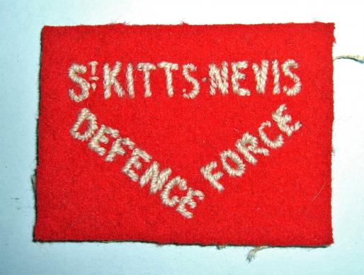 West Indies  - St Kitts Nevis Defence Force Embroidered White on Red Felt Shoulder Title