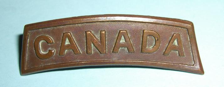 WW1 Canada - Bronze Shoulder Title  - Maker named Caron Bros, Montreal 1915
