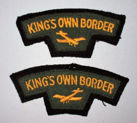 Kings Own Border Regiment Matched Facing Pair of Embroidered Yellow on Green Cloth Shoulder Titles