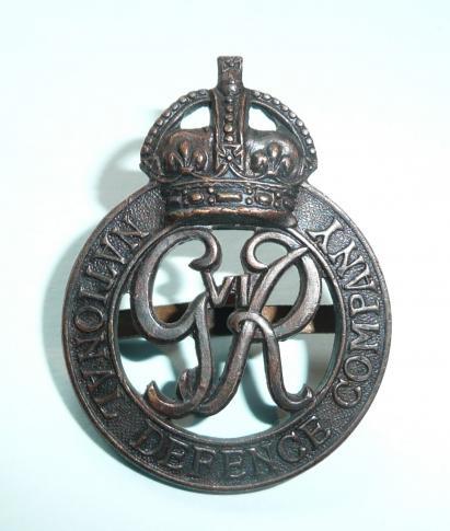 National Defence Company Bronze Cap Badge  - GVI Cypher