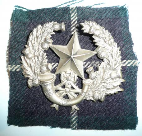 The Cameronians (Scottish Rifles) White Metal Glengarry Badge on Original Tartan Cloth Backing
