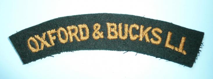 Oxford & Bucks LI Embroidered Yellow Gold on Rifle Green Felt Cloth Shoulder Title