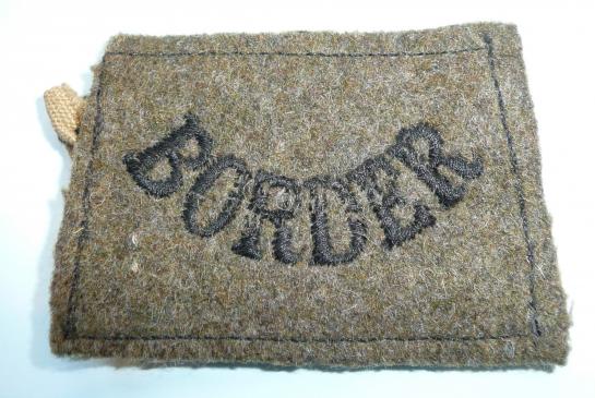 WW2 Border Regiment Embroidered Black on Khaki Cloth Slip-on Shoulder Title