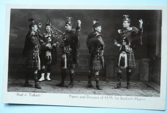 Post WW1 Real Photographic Gloss Black & White Postcard- Pipers and Dancers of the 1st Seaforth Highlanders