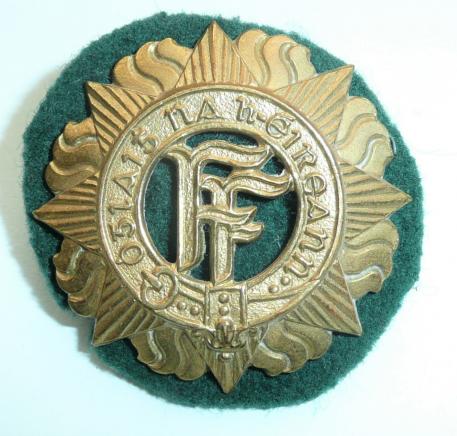Eire Irish Army Brass Cap Badge with Green Felt Backing Cloth