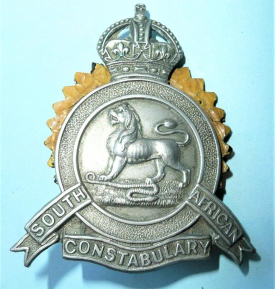 Edwardian South African Constabulary Large White Metal Slouch Hat Cap Badge with Original Yellow Patent Leather Backing