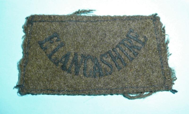 WW2 East Lancashire Regiment Woven Black on Khaki Slip-on Shoulder Slide