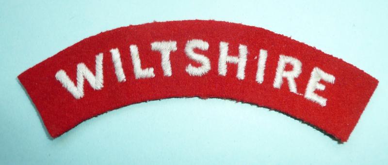 The Wiltshire Regiment  Embroidered White on Red Felt Cloth Shoulder Title