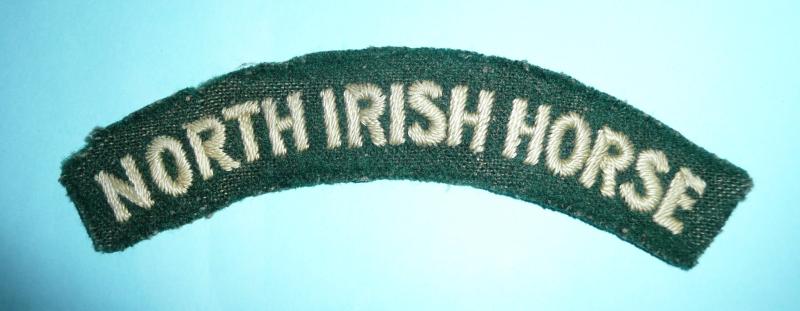 WW2 North Irish Horse (NIH) Embroidered White on Green Felt Cloth Shoulder Title