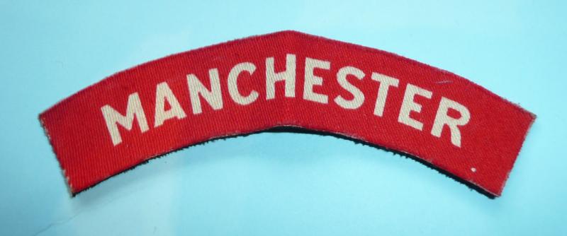 WW2 Manchester Regiment Printed White on Red Cloth Shoulder Title