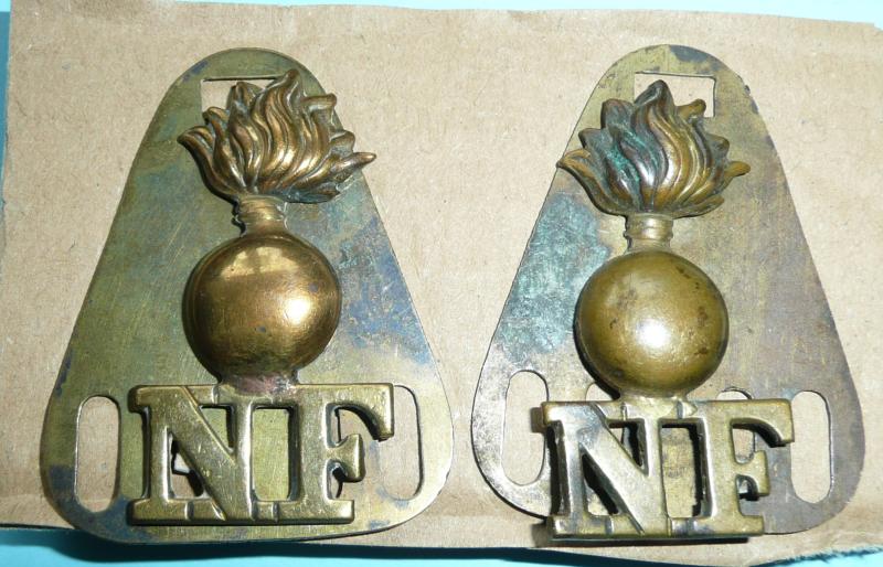 WW1 Pair of Northumberland Fusiliers (NF) Other Ranks Shoulder Titles on Backing Plates