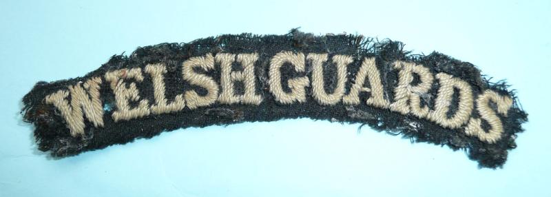 WW1 Welsh Guards White on Black Embroidered Cloth Shoulder Title