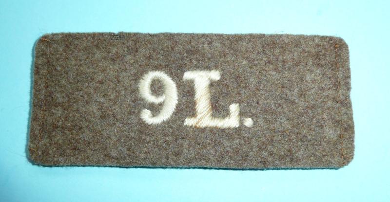 WW1 - '9L' - 9th Queen's Royal Lacners Woven White on Khaki Cloth Slip On Shoulder Title