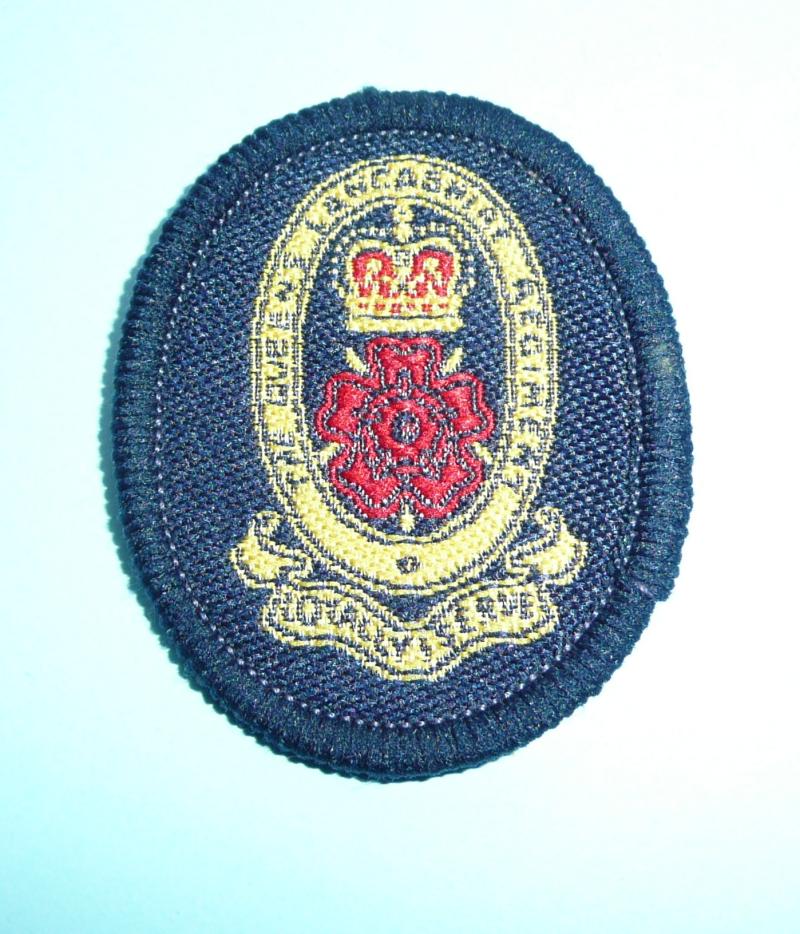 Queen's Lancashire Regiment (Yellow & Red) On Black Oval with Queen Elizabeth's Crown, Woven Other Ranks' beret cap badge